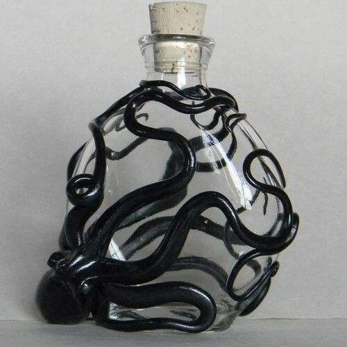 yourmomiskindofscary:  Glass bottle and polymer clay