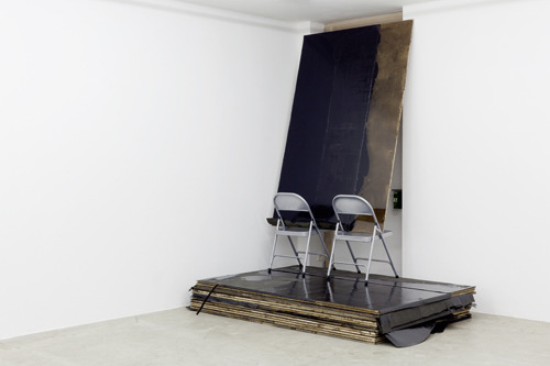 Lena Henke Hang Harder (2012) Installation view: tar paper, epoxy resin, folding chairs