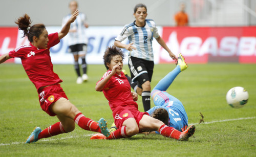 womenandsports: Tang Jiali #24 and Wang Shuang #15 of China compete during the match against Argenti