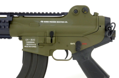 Daewoo DR-300 7.62x39 caliber rifle. Rare 7.62x39 rifle updated with rails, coated OD green, folding