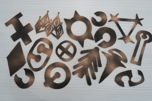 Wooden Prehistoric Inspired Symbols for the participatory theatre piece, ‘Scar of the Sabretooth’ Ba