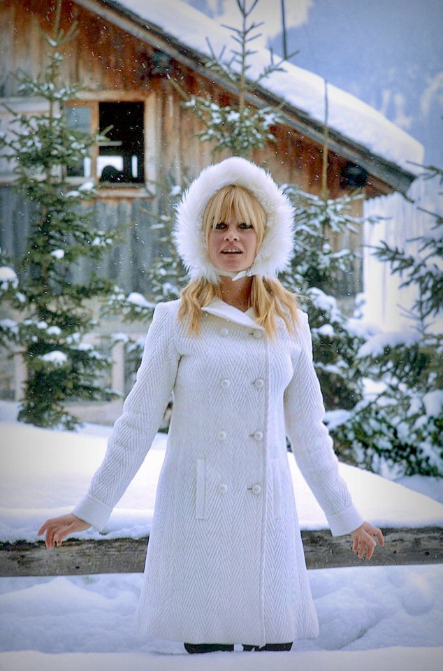 Brigitte Bardot modelling winter fashion by Francois Gragnon. 1966