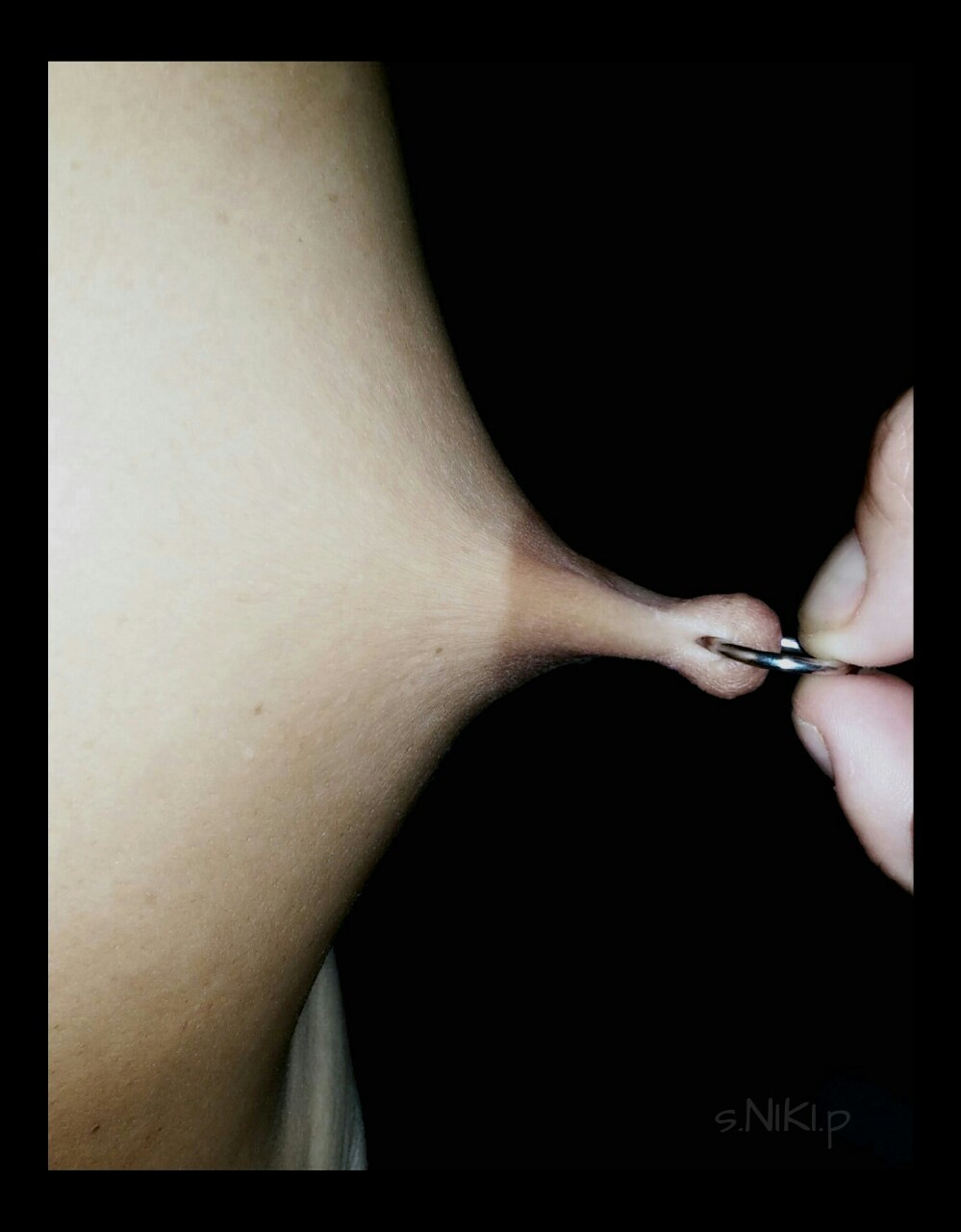 nikikittenniki:  Stretching Nikis nipples!!!