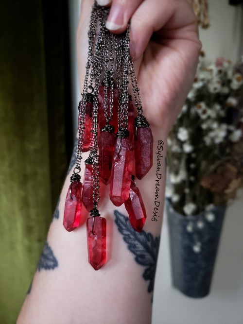 One of my best sellers. Red Quartz point necklaces on gunmetal chain.Grab yourself one on my www.ets