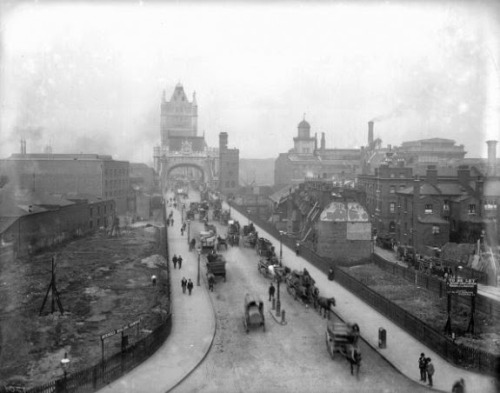 Traffic on the southern part of the Tower Bridge, spanning the Thames near the Tower of London (c.19