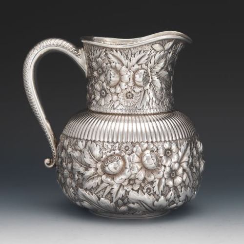 Silver Repousse Water Pitcher around 1900 Gorham hallmarks on the bottom: lion, anchor and &ldqu