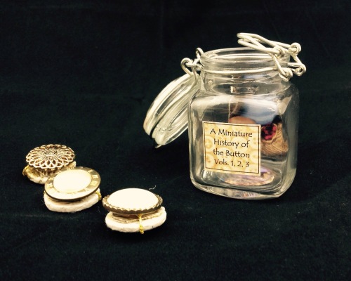 uispeccoll:For this #miniaturemonday we’ve got some button accordion books in a jar, &lsq