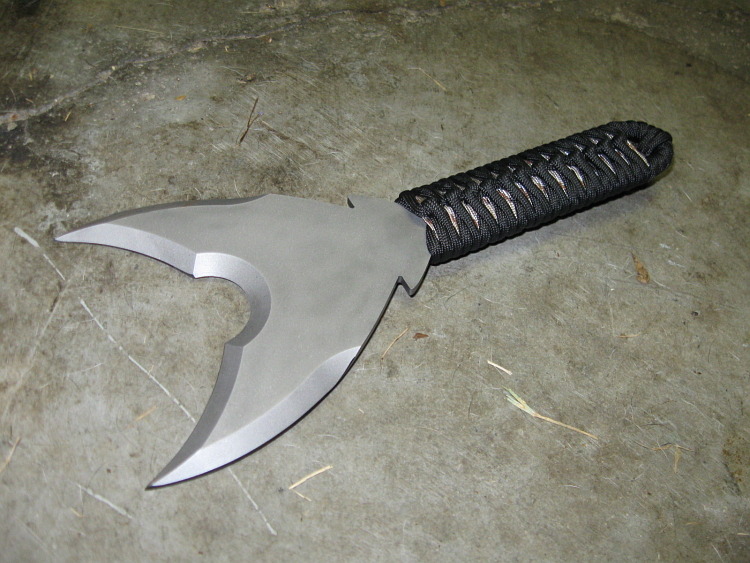 gunrunnerhell:  Garrison Fighting KnifeAn oddly shaped knife, using the term loosely,