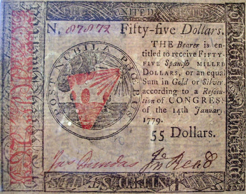 Continental currency in the amounts of $0.33 and $55, printed during the American Revolution. These 