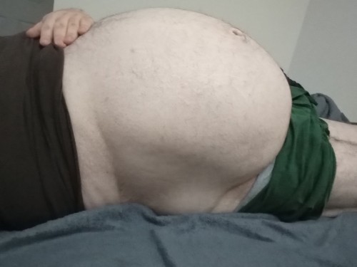 earthyjim:bigbellyct:Celebrated Pi day. Bloated and beached on the bed. Time for