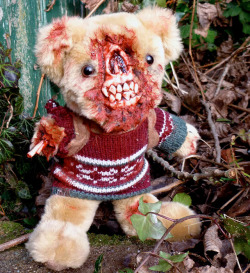 sixpenceee:  Artist Turns Adorable Teddy Bears into Creepy ZombiesEnglish artist Phillip Blackman uses zombie-flick special effects makeup to turn the lovable toys into creepy undead that will keep you awake at night. He says the idea for his zombified