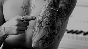 justnbiebier:  Justin Bieber’s Personal Decoder for His Many, Many Tattoos | GQ