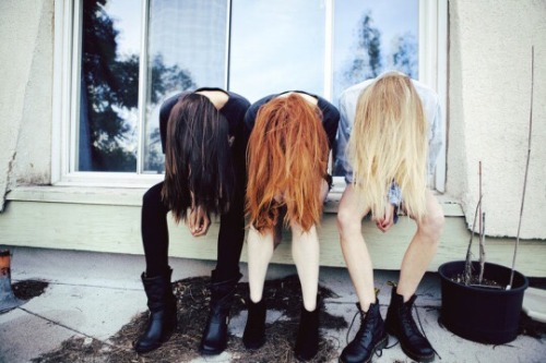 Mary Macdonald, Lily Evans, and Marlene Mckinnon trying to take a cute picture. -taken by Dorcas Mea