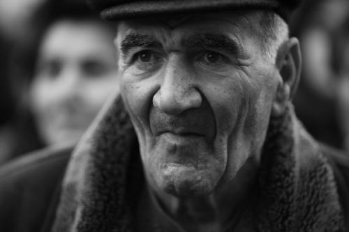 Faces of political demonstration Portraits made at one of the Armenian electional meetings of o