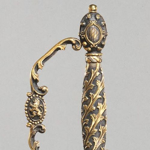 art-of-swords: Parade Sword with Scabbard Maker: hilt made by Johann Stroblberger, German (active Munich) Dated: circa 1825 Culture: German Place of Origin: made in Munich, Germany Medium: steel, engraved and gilded; cast brass, steel gilded with silver;