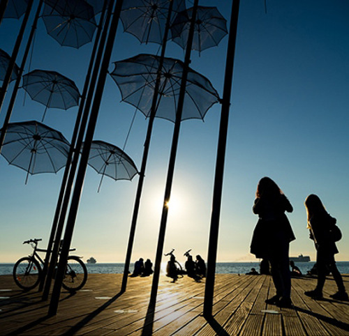 Thessaloniki from dawn to dusk‘The Umbrellas’ by sculptor Giorgios Zoggolopoulos at dawnThe Ro
