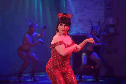 GIFset Of DeLa In The Tartan Pantsuit That Nobody Asked For