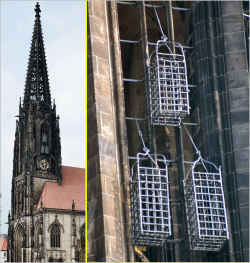 toughbondagebottom:  These cages are way up in the tower of St. Lamberti church in Muenster, Germany. I want the one on top. Who wants the other two?   i  will take one