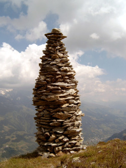 mitchellgoldstein:  Cairn is a man-made pile (or stack) of stones. It comes from the Scottish Gaelic: càrn (plural càirn). Cairns are found all over the world in uplands, on moorland, on mountaintops, near waterways and on sea cliffs, and
