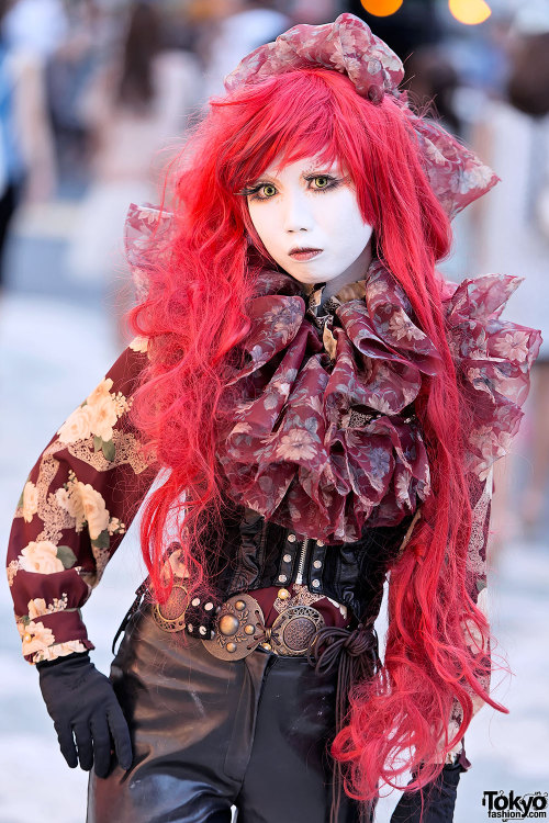 Japanese shironuri artist Minori on the street in Harajuku w/ long red hair &amp; corset.