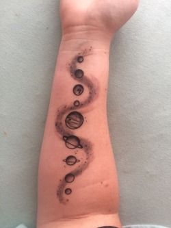 princessofmilkyway: (pls forgive the redness, its still healing) newest tattoo of our solar system. i know shepard would approve of my space tattoo addiction &lt;3  