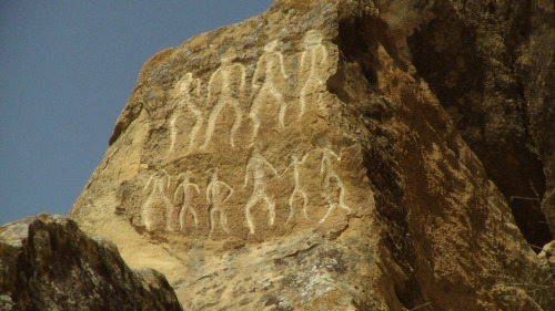 Petroglyphs in the National Park Gobustan in Azerbaijan. These ancient rock carvings date back to 10