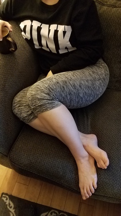 My pretty wife sitting with her morning coffee and her naked toes.please comment