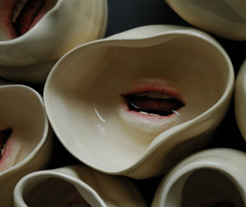 from89:  Ceramic tableware with mouths (by Ronit Baranga) 