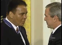 astaghfurallah:  hopeful-melancholy:  Ali gives Bush the crazy sign   THIS IS ICONIC
