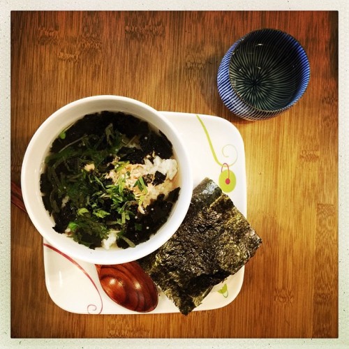 Salmon soupy rice- with nori, shiso, and radish sprouts. Salmon onigiri. Sencha-matcha green tea. #t