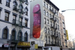 enascuas:  The penis painting on a side of a building on Broome Street NYC is the work of Swedish street artist Carolina Falkholt