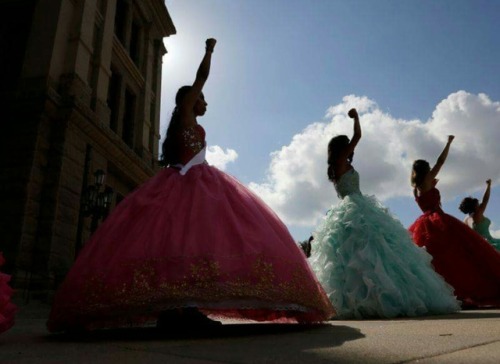 ithelpstodream:On Wednesday, a group of 15 teenage girls, dressed in brightly colored gowns, stood i