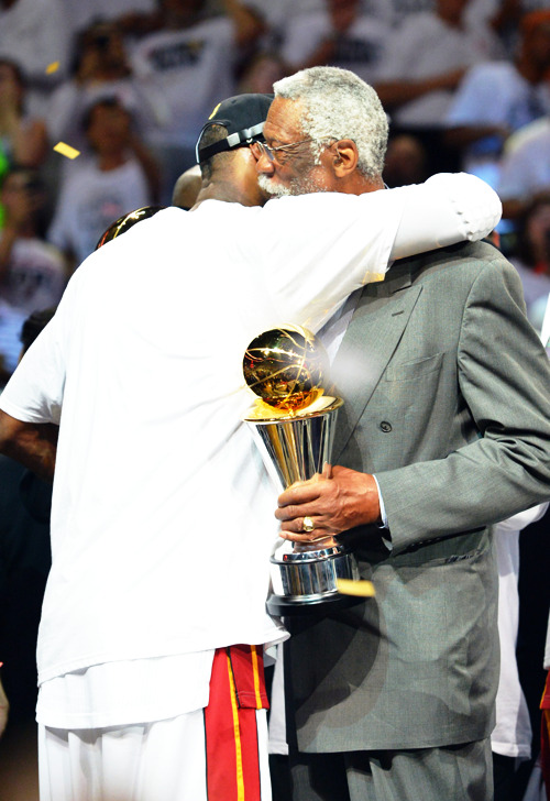 fuckyeahmiamiheatt:  LeBron James receiving the Bill Russel Finals MVP award. 