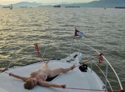 a-dominant-man:  I like to punish my girl by tethering her, naked,  to the front of my yacht. While I drink cocktails and enjoy the evening, she is splayed out for everyone to see, splashed with cold salt water, humiliated.