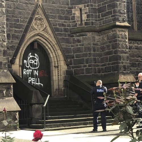 “Rot in Hell Pell” Seen on St Patrick’s cathedral in Melbourne in response to the 