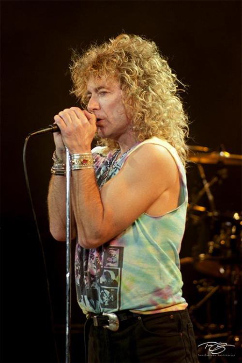 Robert Plant, 1988.  The guyliner, big hair, sleeve-less years.  Photo © Timm Chapman.  (Please do n