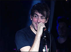 wine-drunk-lover:   cupidsshotgun:  never forget the time a fan actually made alex gaskarth nervous enough to blush during a show.  his blush is redder than me trying to get a tan and failing 
