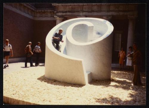 An 82 year-old Isamu Noguchi tests his Slide Mantra at the 1986 Venice Biennale. Unknown photographe