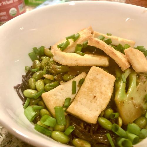 Snow day brunch! Soy ginger garlic edamame and broccoli, with pan fried tofu over purple rice ramen.