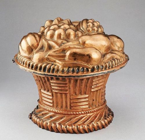 Cake mould in the shape of a fruit basket, 19th century, Embossed copper. Via Koller Auctions.