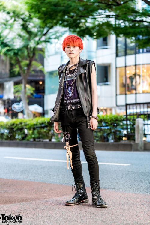 20-year-old Japanese student Kanade on the street in Harajuku wearing a DIY punk leather vest over a