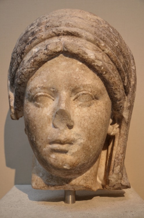 Ancient Roman marble head, from a portrait statue of a veiled priestess of Vesta.  Artist unknown; c