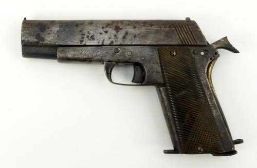 fmj556x45:Vietnamese Copy 1911 .45 ACP caliber pistol. Vietnamese made copy of Colt 1911, one of the