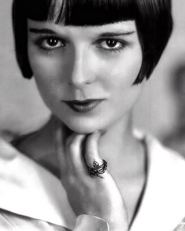 Louise Brooks wearing a serpentine asp ring