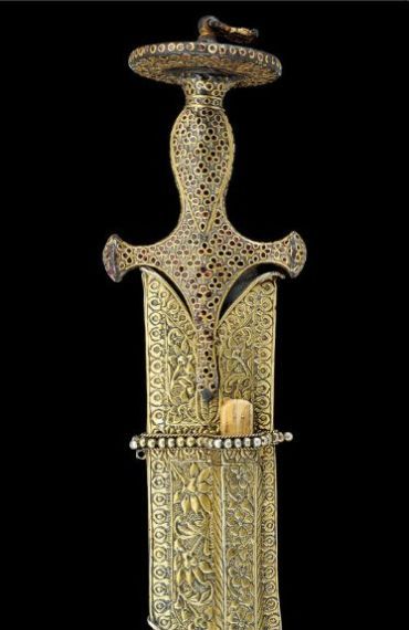 art-of-swords:Tulwar SwordDated: 1700Culture: Mughal, IndianMedium: iron, ruby, gold, silver, velvet