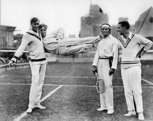 Bill Tilden, Charlie Chaplin, Douglas Fairbanks Sr. and Manuel Alonso playing some tennis, 1923