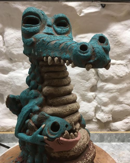 Croc with its pet piranha is almost ready for first firing. #ceramics #ceramicart #ceramicsculpture 