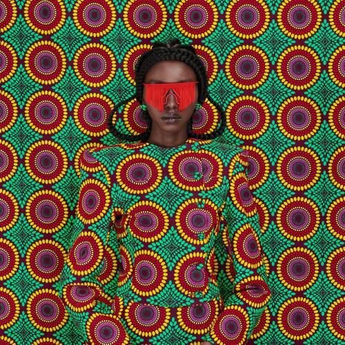 Vibrant Textiles and Repurposed Eyewear Camouflage the Subjects of Thandiwe Muriu’s Celebrator