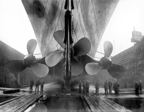 sartorialjohnnyboy:  The RMS Titanic in dry-dock, Belfast after her launch in 1911. The propellers d