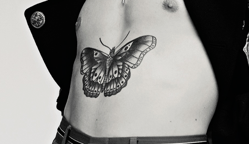 worldstyles: “The butterfly on his torso is based on and old French prison tattoo